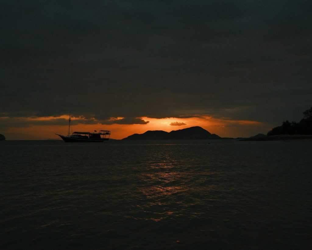 The sun is setting over a body of water